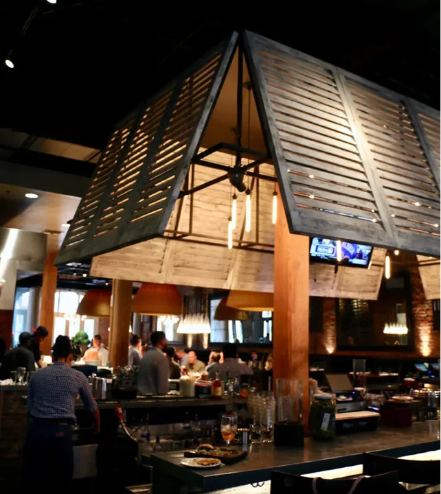 Brown-Louvered-interior-shutters-on-lighting-fixture-Central-Restaurant-Montgomery-3