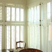accordian-shutterset-white-window-interior-4