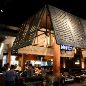 Brown-Louvered-interior-shutters-on-lighting-fixture-Central-Restaurant-Montgomery-3