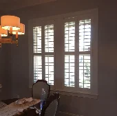 plantation.interior.white.dining.window