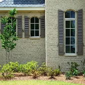 combination.exterior.gray.brown.beige.arch.window